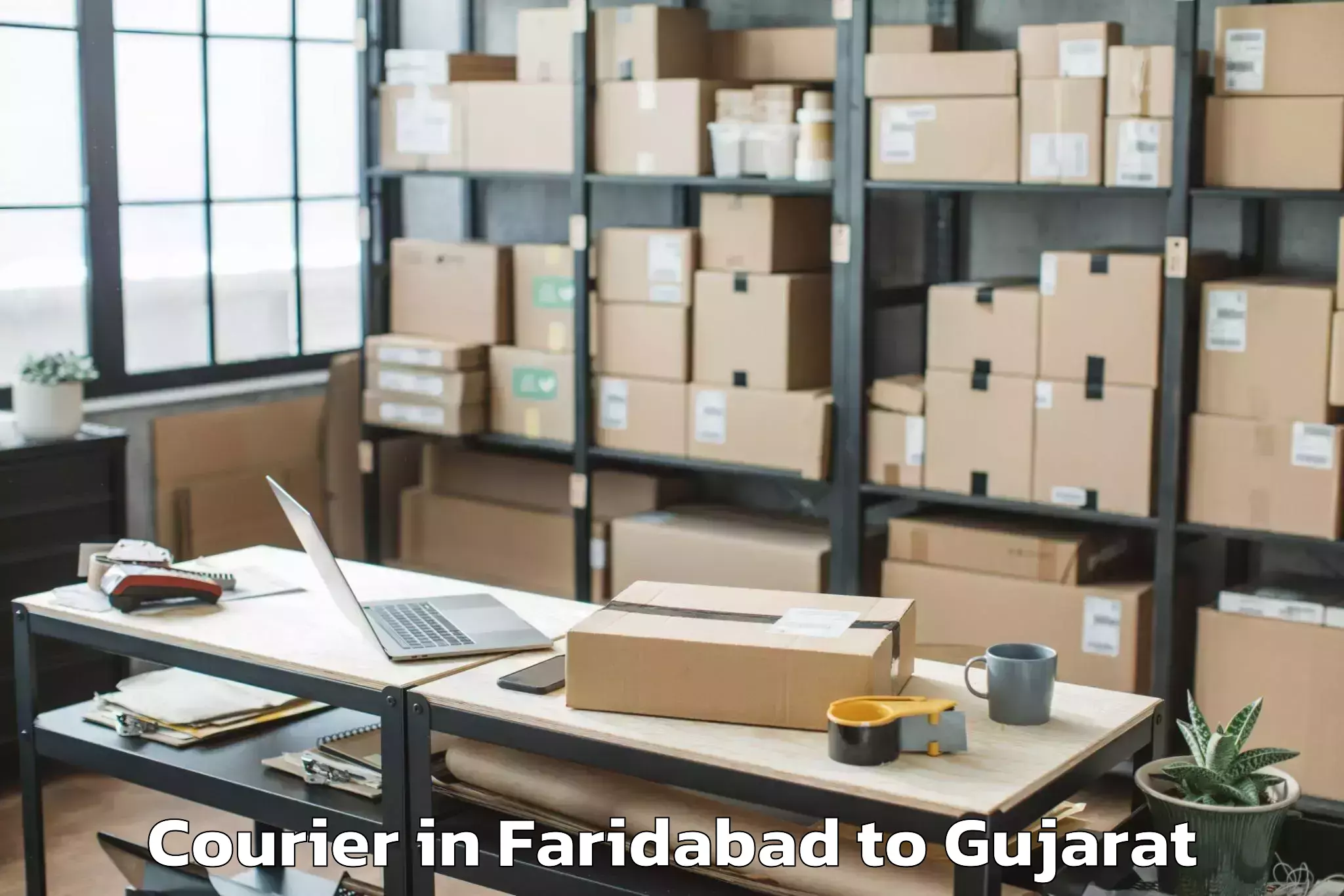 Get Faridabad to Becharaji Courier